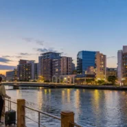 Traveler comparing budget hotels in Fukuoka near Hakata Station and Tenjin