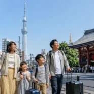 A family comparing hotels in Ueno, Asakusa, Shinjuku, central Tokyo and the Tokyo Disney Resort area