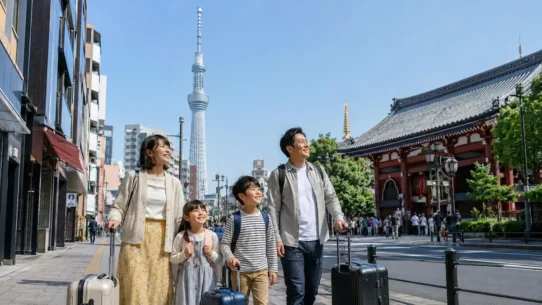 A family comparing hotels in Ueno, Asakusa, Shinjuku, central Tokyo and the Tokyo Disney Resort area