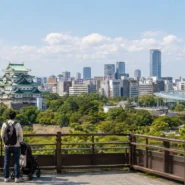 Family arriving at a convenient Nagoya hotel with children, luggage and a stroller