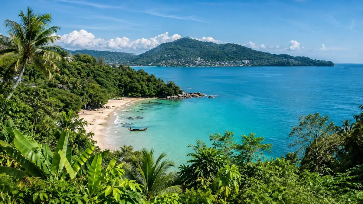 Phuket beach in clear weather showing the best time to visit Phuket