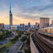 Fukuoka subway train and station signs for airport, Hakata and Tenjin travel