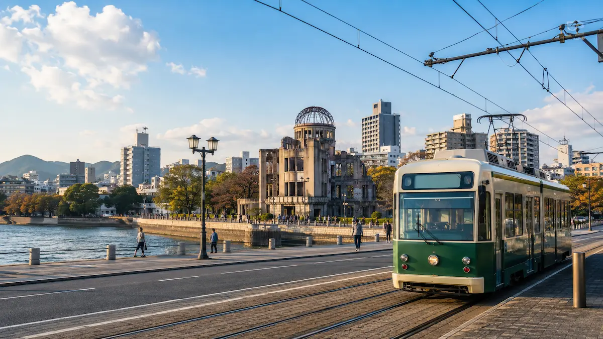 Hiroshima streetcar passing the Atomic Bomb Dome for a Hiroshima transportation guide
