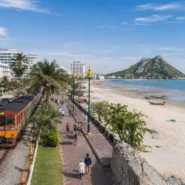 Hua Hin transportation guide showing train, green songthaew, airport coach and local travel options