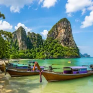 Krabi transportation guide showing airport transfers, songthaews, longtail boats and ferries in Krabi, Thailand
