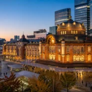 Traveler choosing transport from Seoul Station to central Seoul with luggage