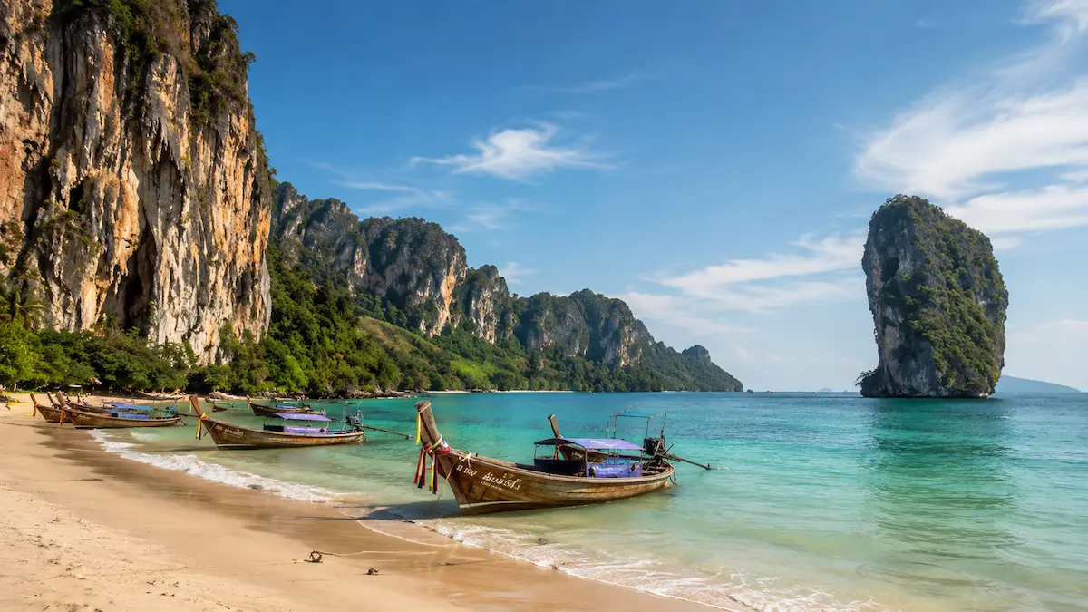 Ao Nang and limestone cliffs in Krabi, Thailand, representing the best areas to stay for first-time visitors