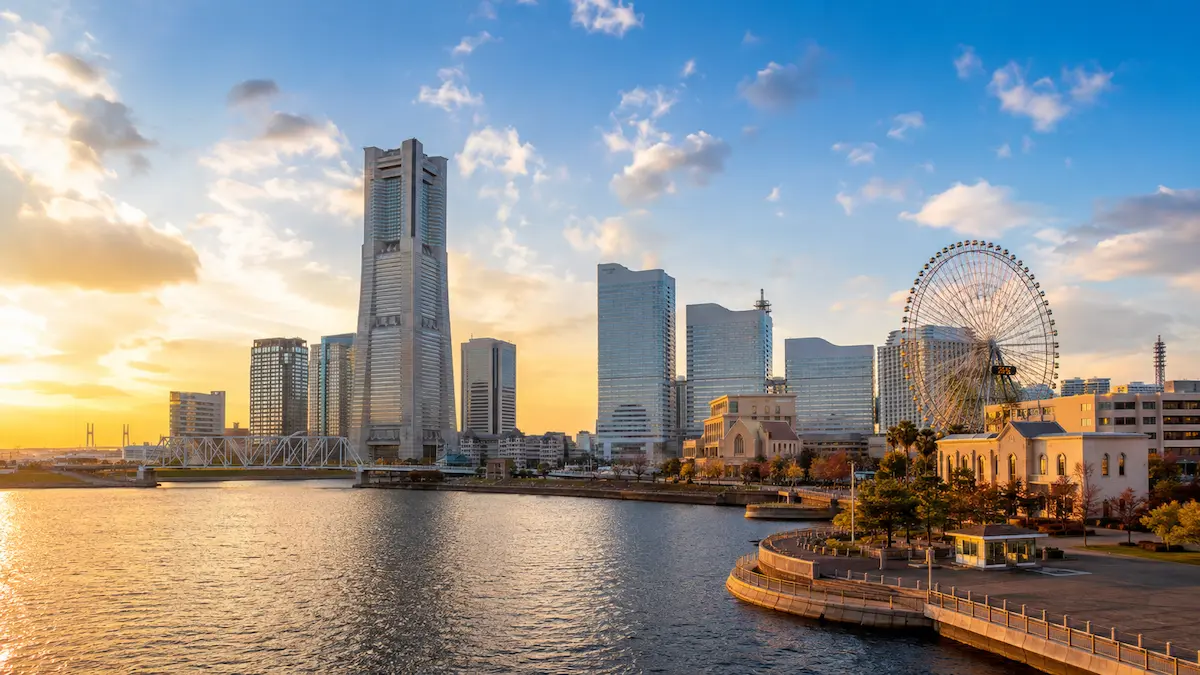 Yokohama waterfront skyline with a traveler planning a realistic daily travel budget